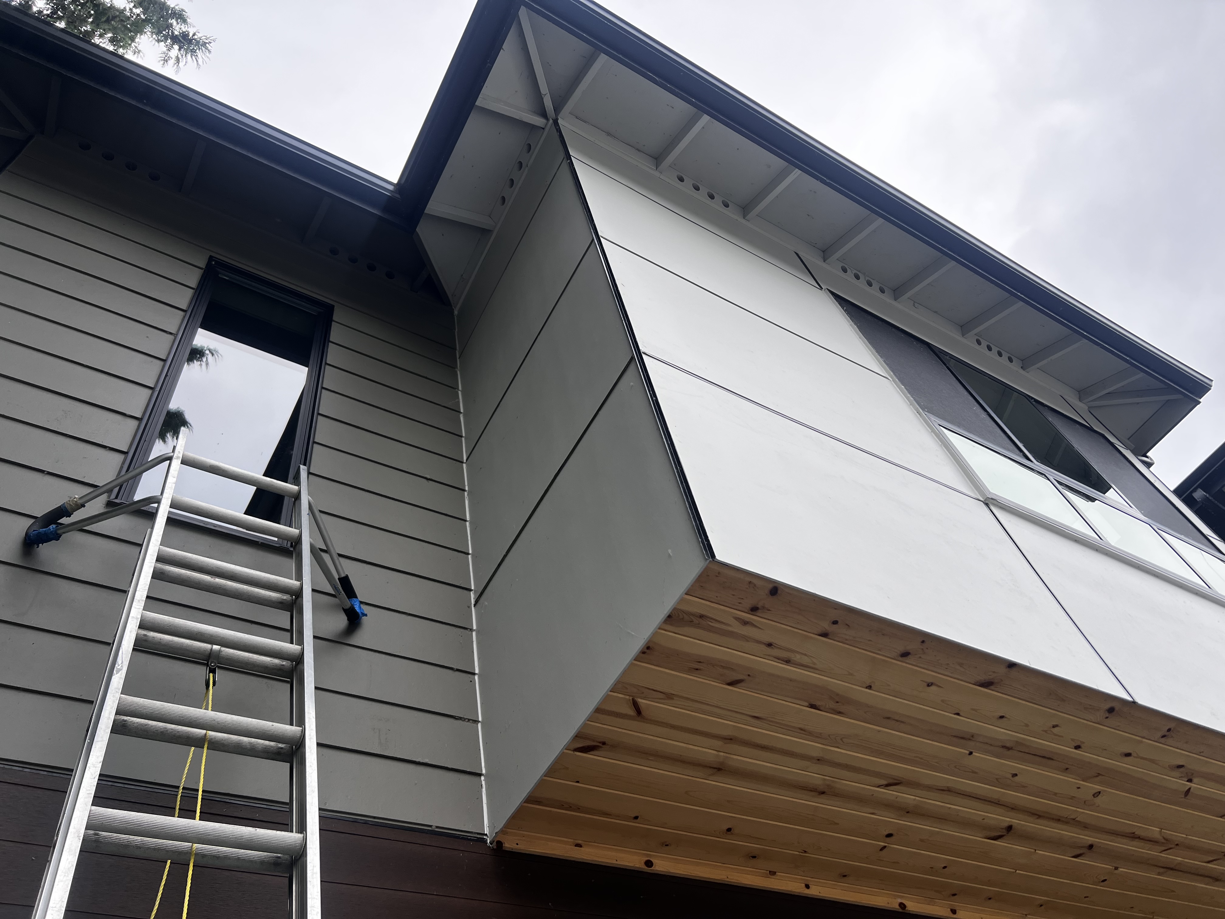 Pro Bright crew set up for exterior window and siding access at a Seattle-area home